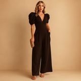 Elegant long jumpsuit for women with tailored fit and flowing silhouette, ideal for galas, dinners, and formal occasions.