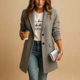 Elegant mid-length coat for women with a tailored fit and refined details. Available in black, camel, and navy for versatile everyday styling.
