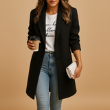 Elegant mid-length coat for women with a tailored fit and refined details. Available in black, camel, and navy for versatile everyday styling.