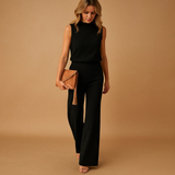 Elegant wide-leg jumpsuit for women with round neckline and refined silhouette, perfect for work, parties, and special occasions.