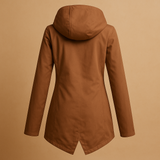 Long waterproof raincoat for women with hood and breathable fabric, available in apricot, blue, coffee, gray, white, and wine red.