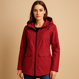 Long waterproof raincoat for women with hood and breathable fabric, available in apricot, blue, coffee, gray, white, and wine red.