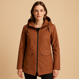 Long waterproof raincoat for women with hood and breathable fabric, available in apricot, blue, coffee, gray, white, and wine red.
