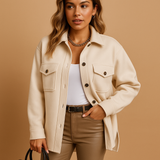 Waterproof windproof jacket for women with fold-over collar, button closure, and pockets. Available in multiple colors, perfect for work or casual wear.