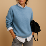 Wool knit sweater for women in a minimalist design, available in black, beige, and taupe, perfect for casual or semi-formal outfits.